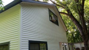 Side exterior of a home with siding