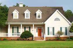 Suburban home with yellow siding